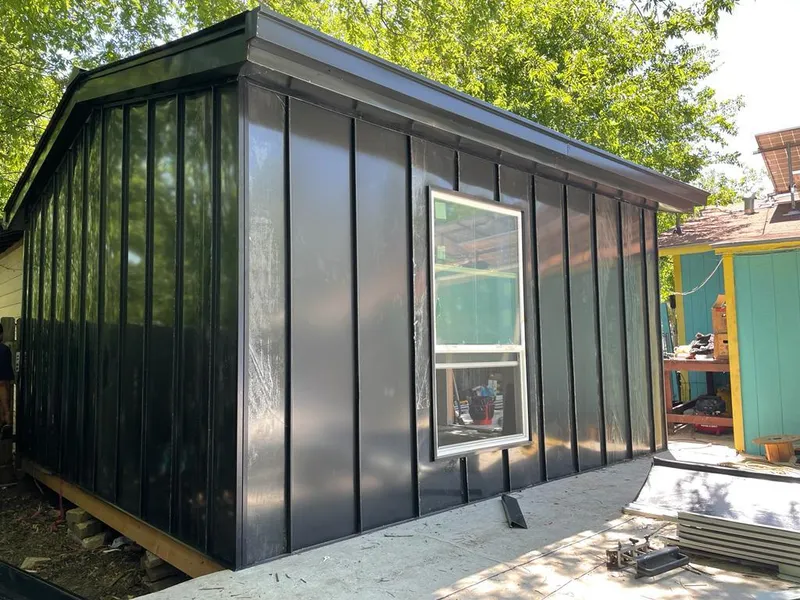 Black standing seam metal wall panels for Roof Inspection in Lincolnia